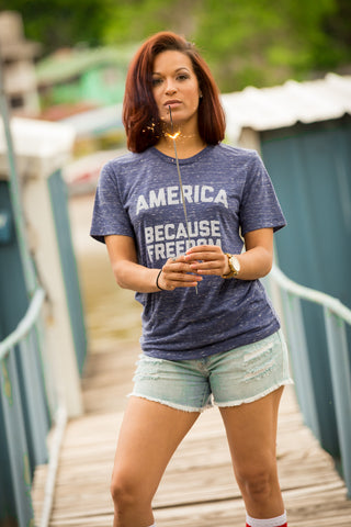 Lush Fashion Lounge American Summer collection | Women's patriotic graphic tees, patriotic graphic t shirts for women, 4th of July tees for women. Model wearing America Because Freedom graphic tee