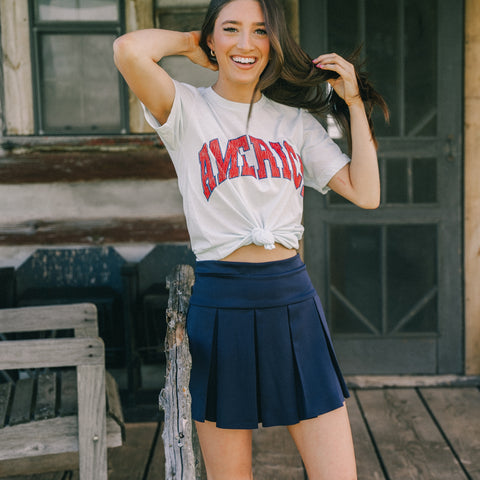 4th of July t-shirt and pleated skirt from Lush Fashion Lounge women's boutique in Oklahoma City