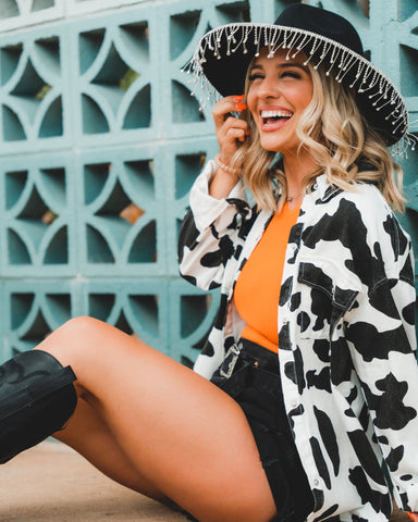 Cow print jacket from Lush Fashion Lounge women's boutique in Oklahoma City