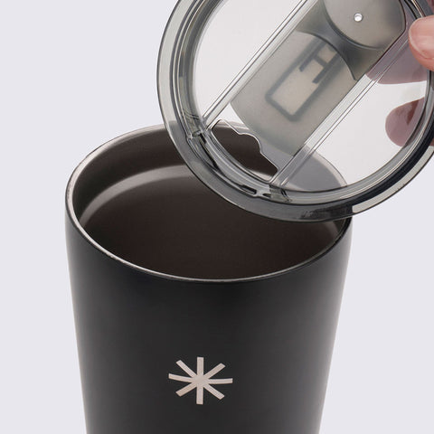 A close-up of the FFORA insulated tumbler in black.