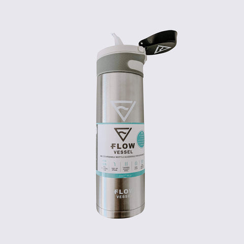 Flow Vessel in Original Platinum drink bottle displayed with lid open and straw extended with grey background.
