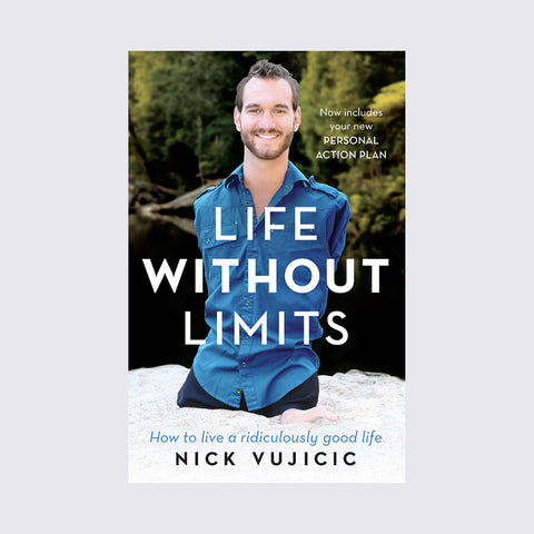  Cover of ‘Life Without Limits’ with author Nick on a beach with blurred forest in background, cover on grey backing.