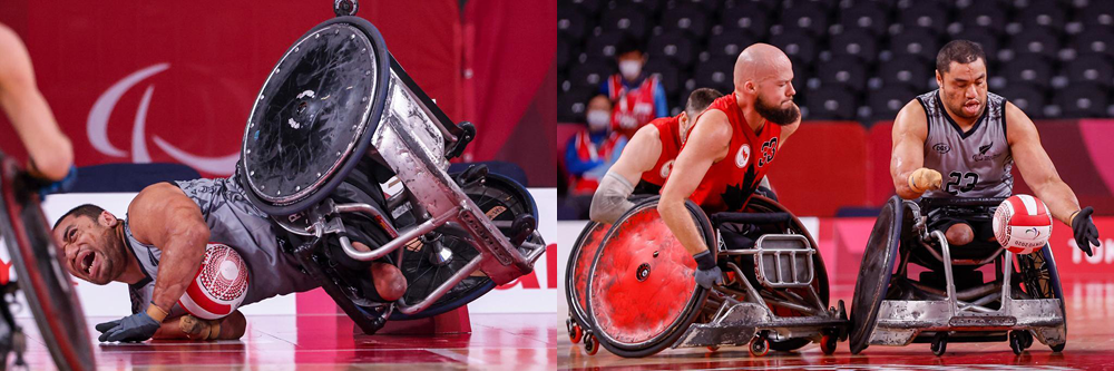 Barney is pictured playing in action with his arm holding the ball against his chest. He has fallen, with hand on the ground and wheelchair on its side. He is on court at the Tokyo 2020 Paralympic games. 