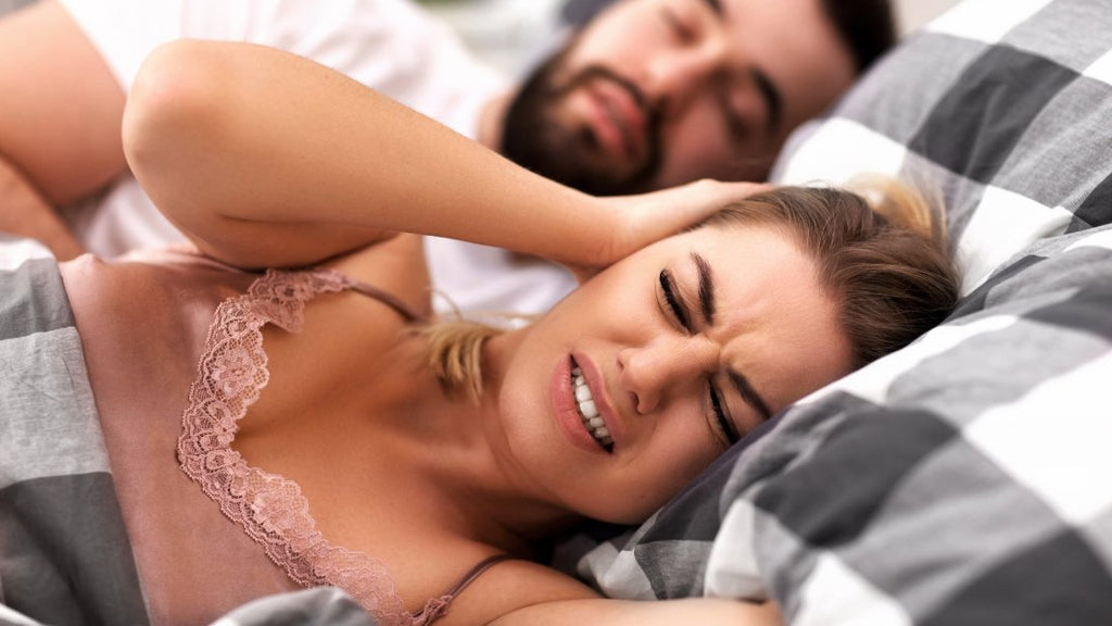 Frustrated woman from husband's snoring