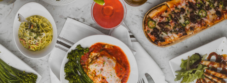 Spread of Italian food at a table