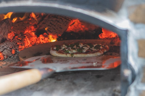 How To Use A Wood Fire Pizza Oven The Right Way