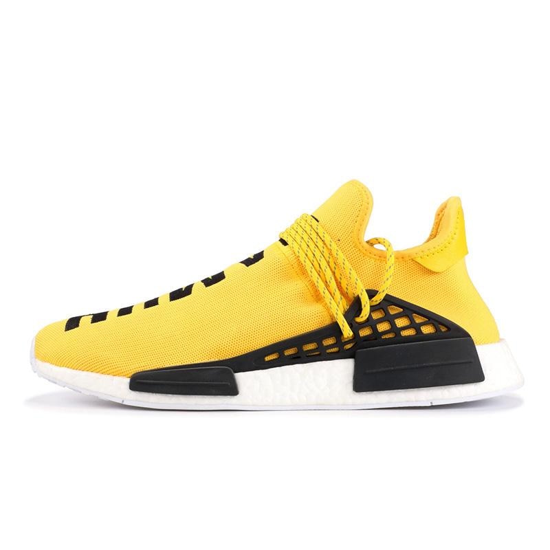 yellow human race trainers