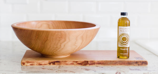 Cherry wood used for a wood cutting board and a wooden bowl by Andrew Pearce Bowls