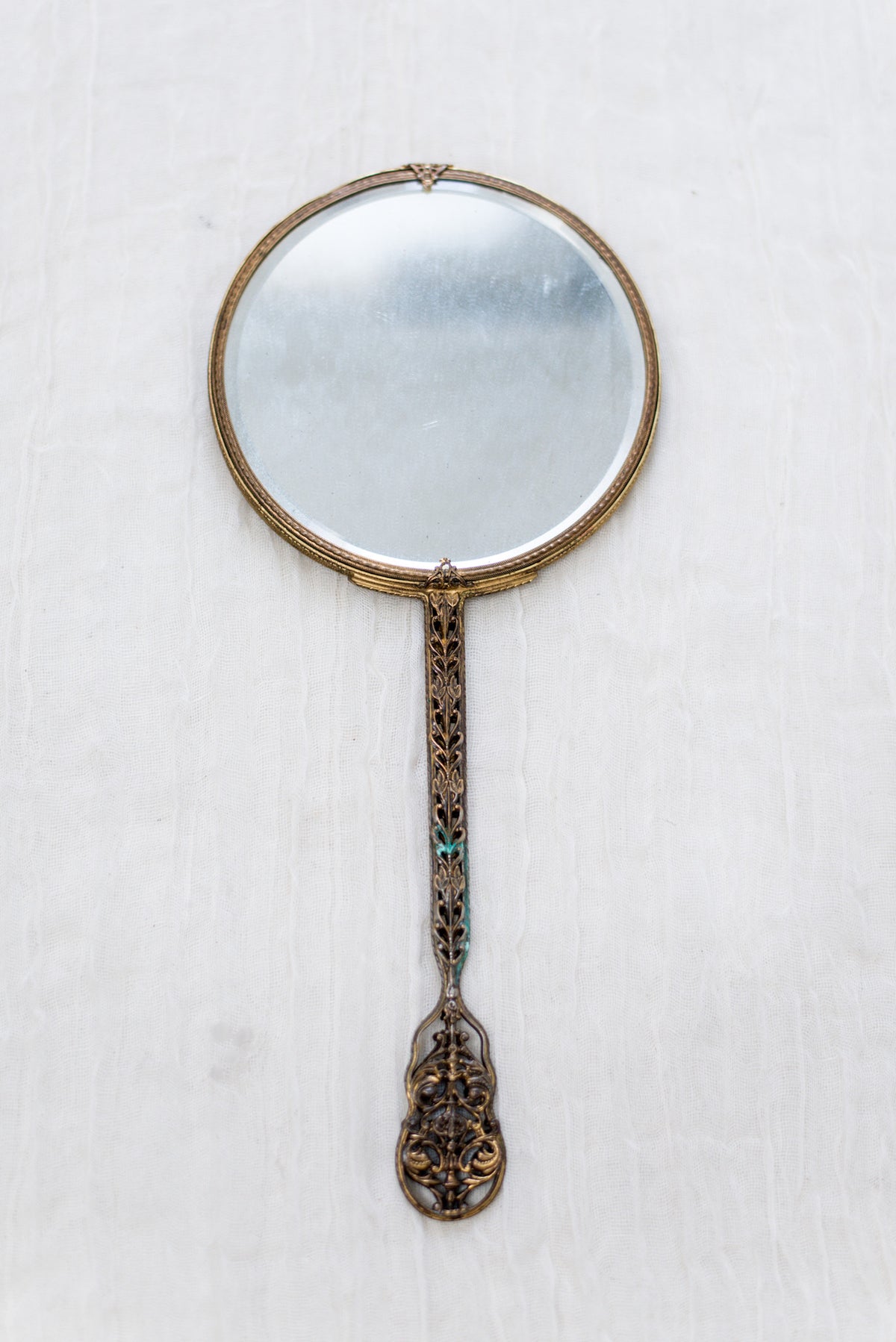 vintage gold hand mirror
