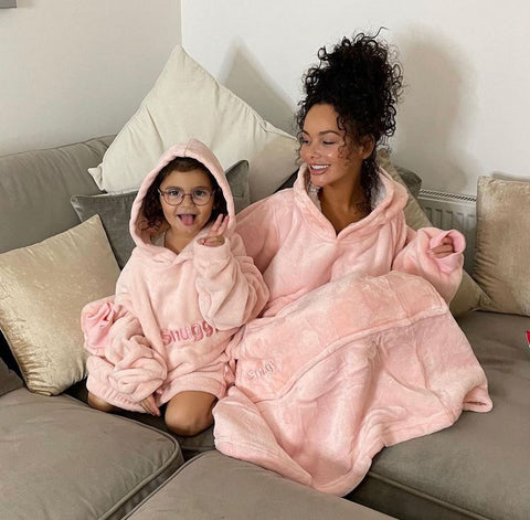 Chelsee Healey and daughter wear Snuggy hooded blankets