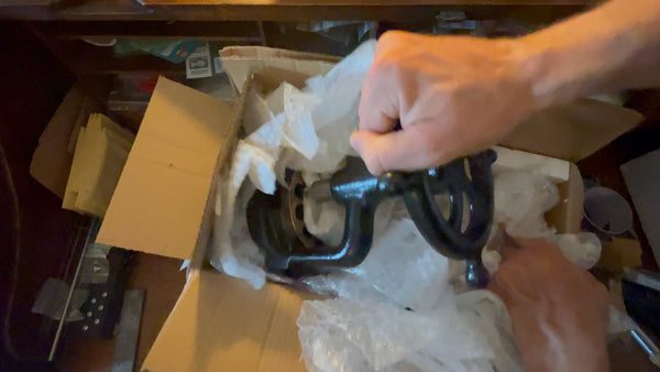 The initial unboxing moment of the Pinfold's ring sizing machine.