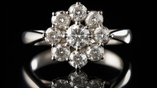 ring design with one large central diamond and small diamonds on either side.