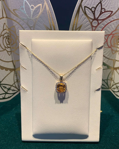 citrine stone on necklace on display 