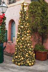 12' Monarch Tree with gold bauble and pinecone ornamentation