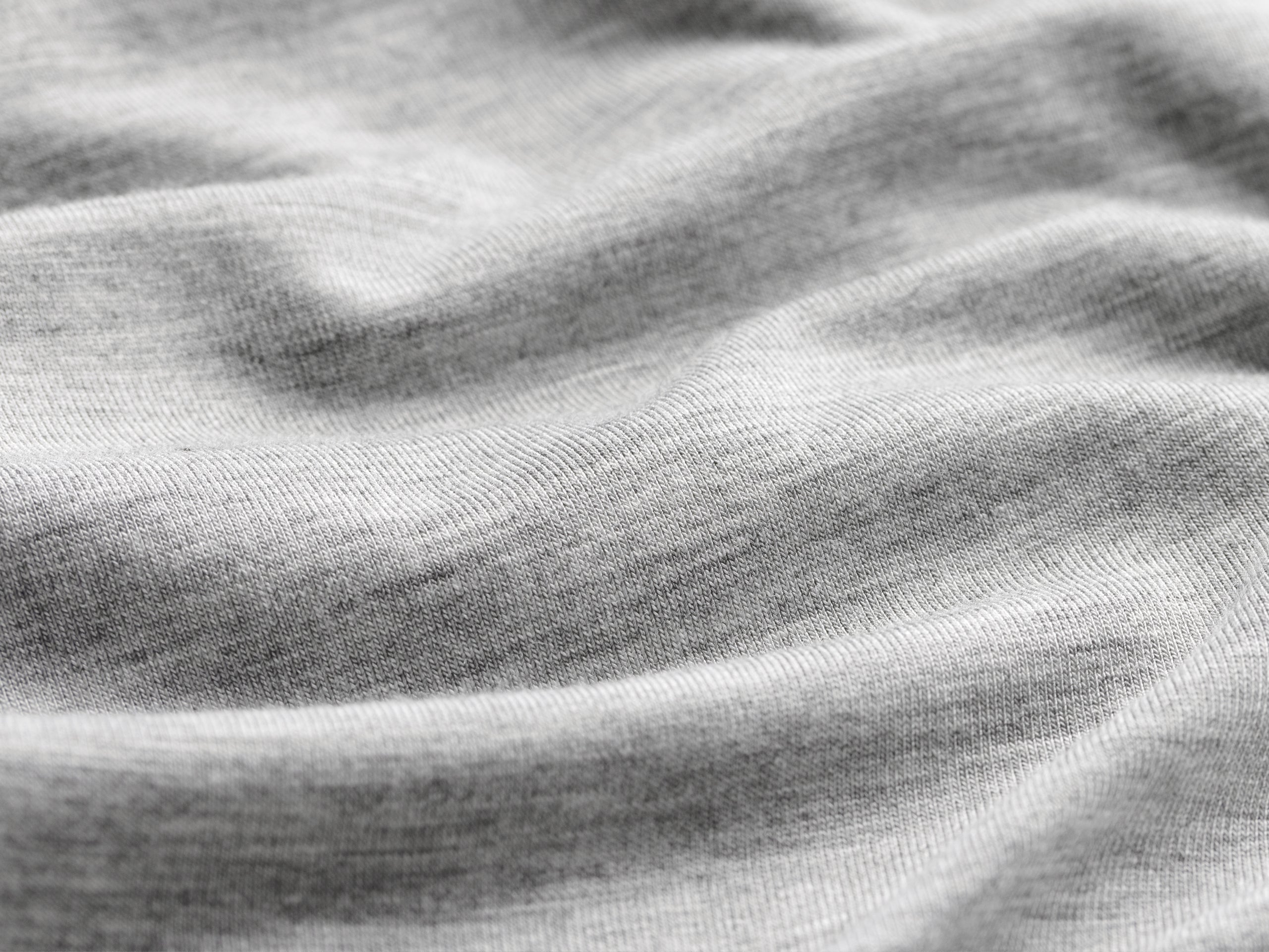 Close up detail shot heather grey micro modal material.