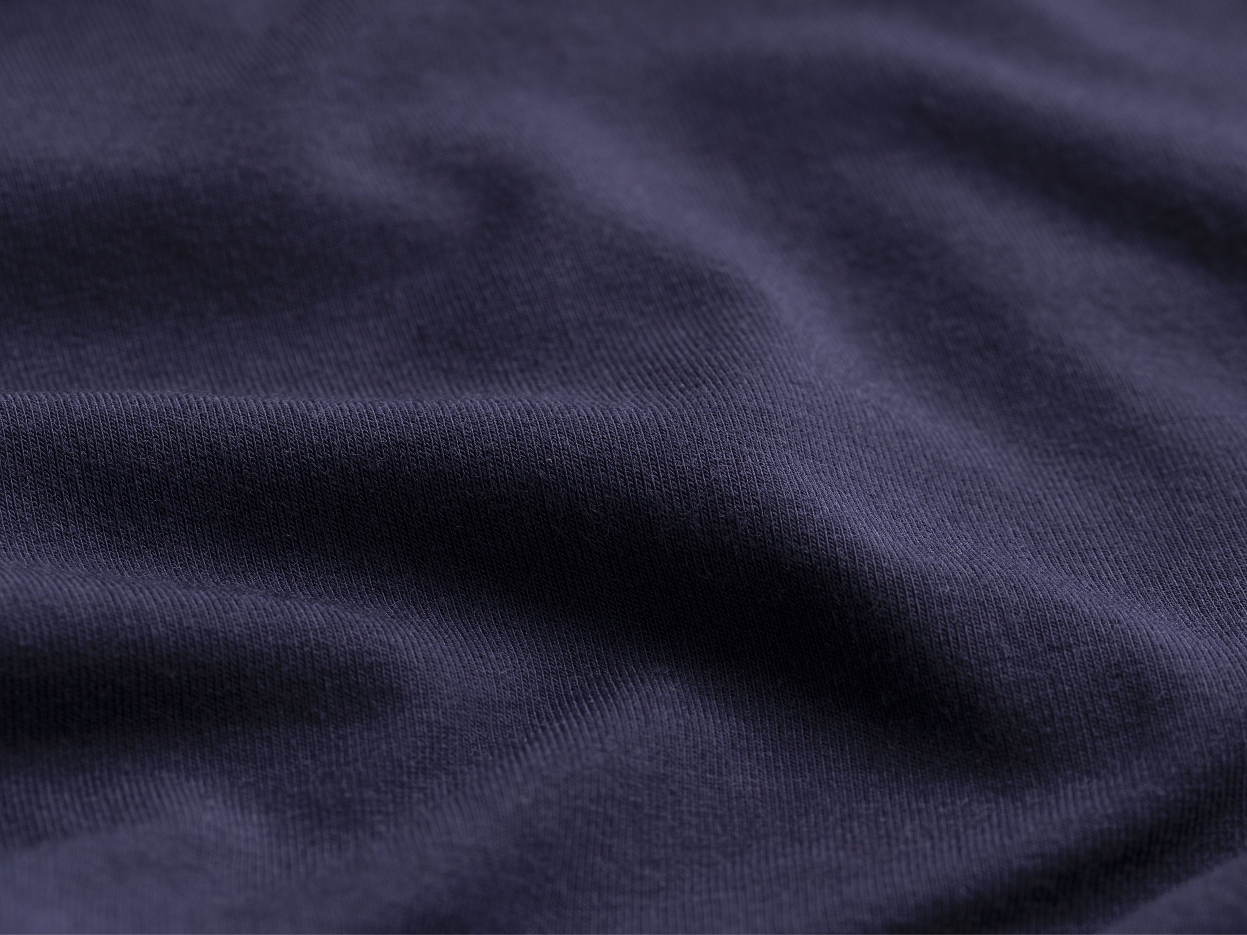 Close up detail shot of navy blue micro modal.