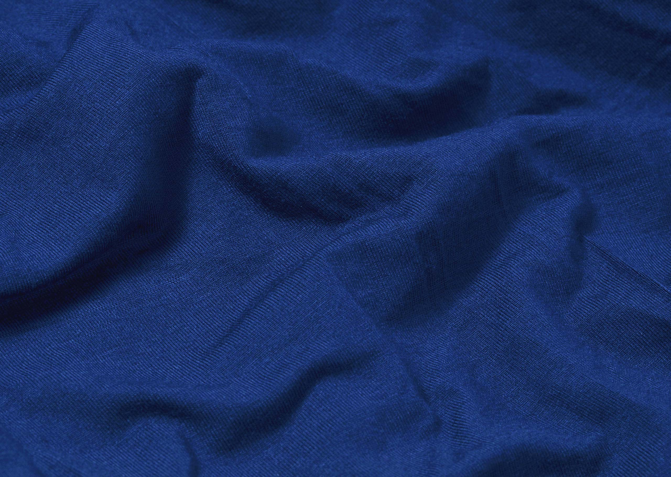 Close up detail shot of soft blue micromodal material.