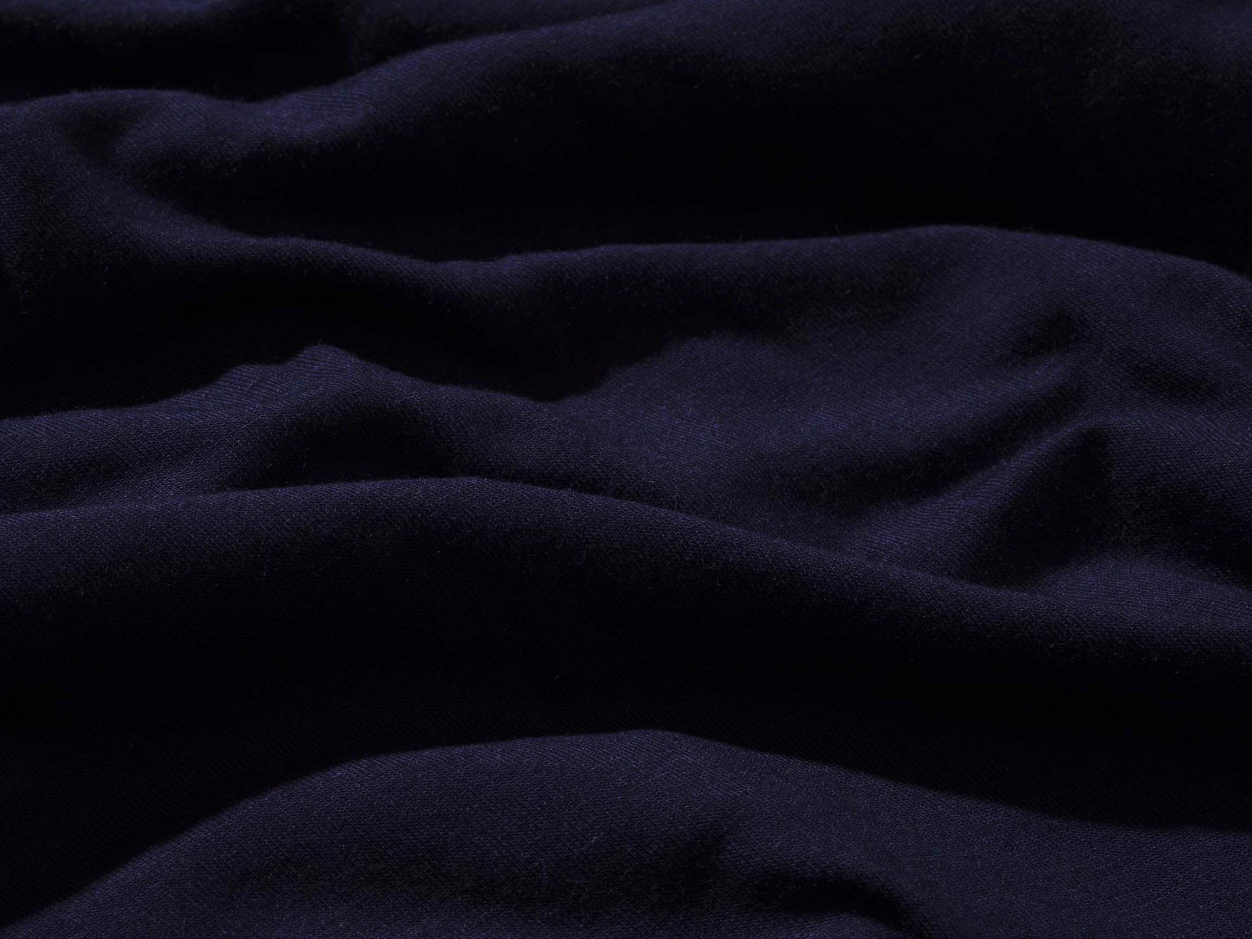 Detail shot of dark blue soft micromodal material