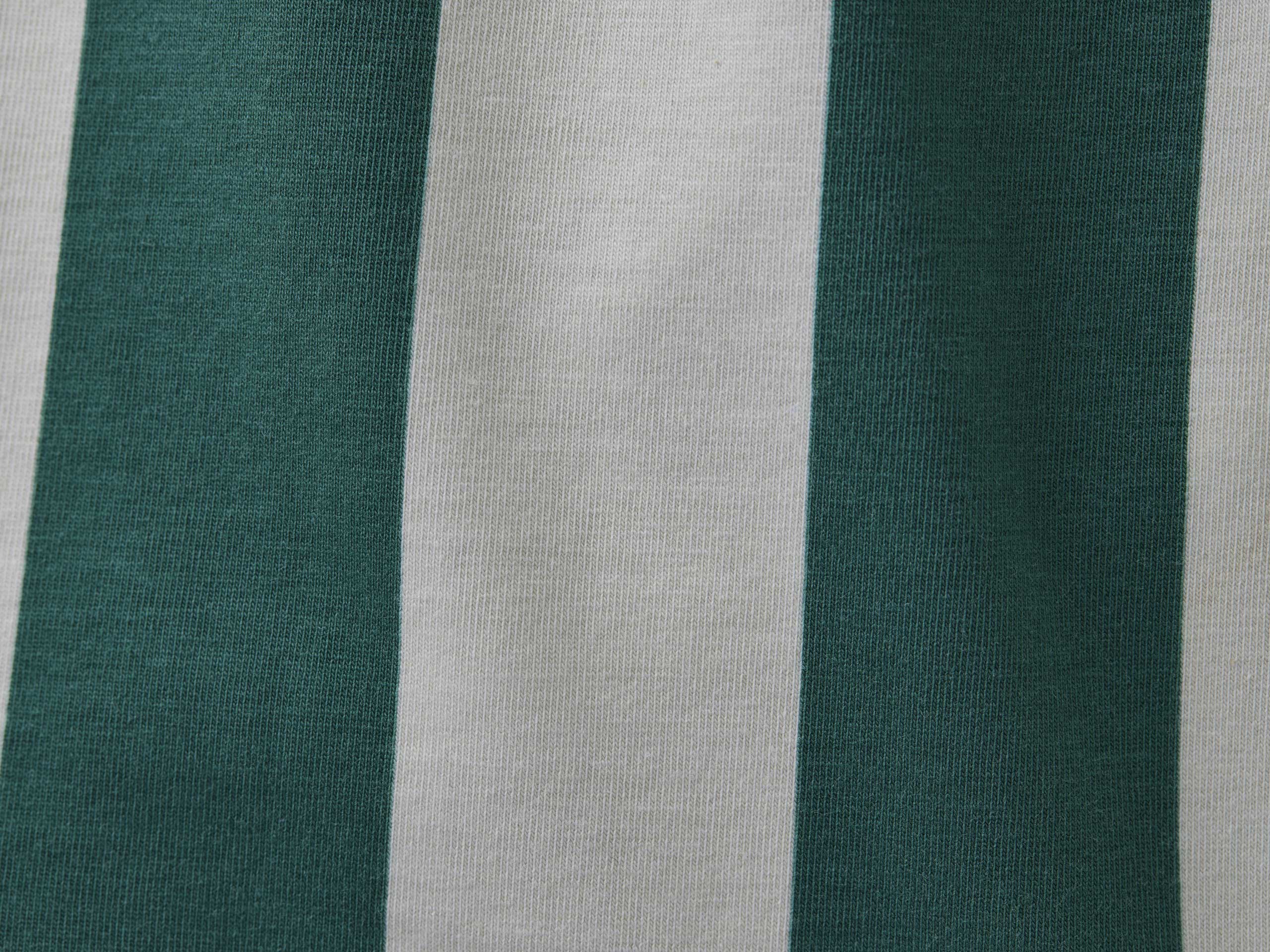 Close up detail shot of hunter green and cream slim fit boxer.