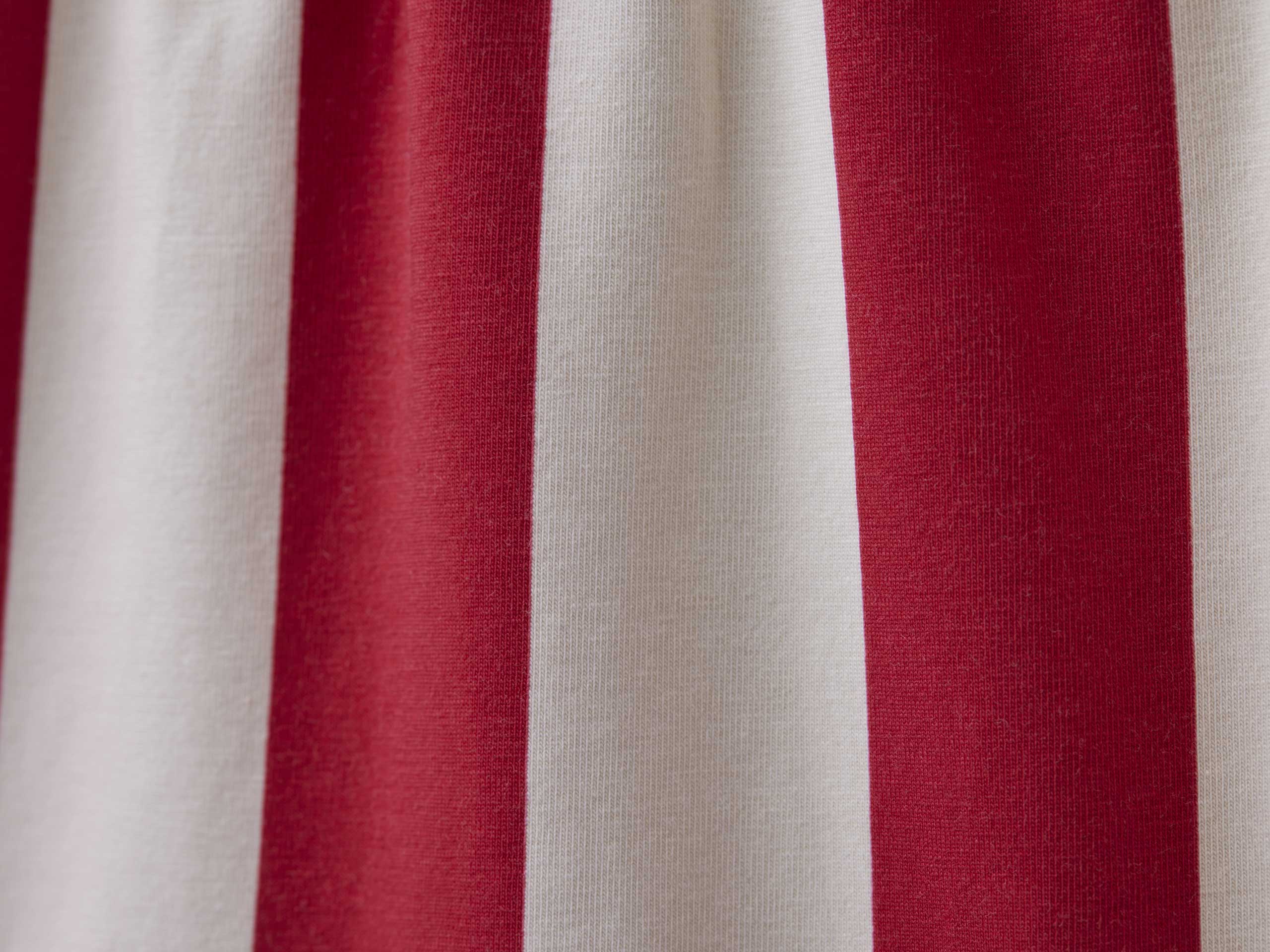 Close up detail shot of red and cream stripe slim fit boxer.