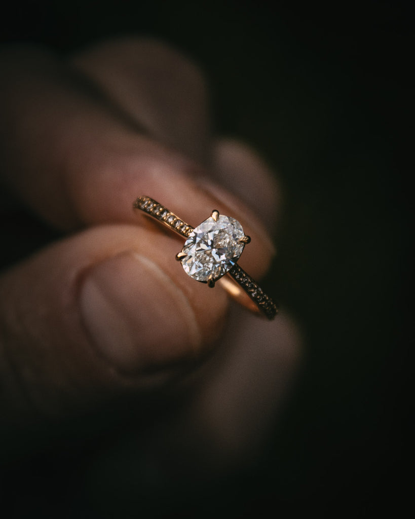 Bespoke Oval Diamond Engagement Ring with Champagne Diamond Band