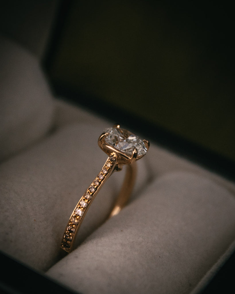 Bespoke Oval Diamond Engagement Ring with Champagne Diamond Band