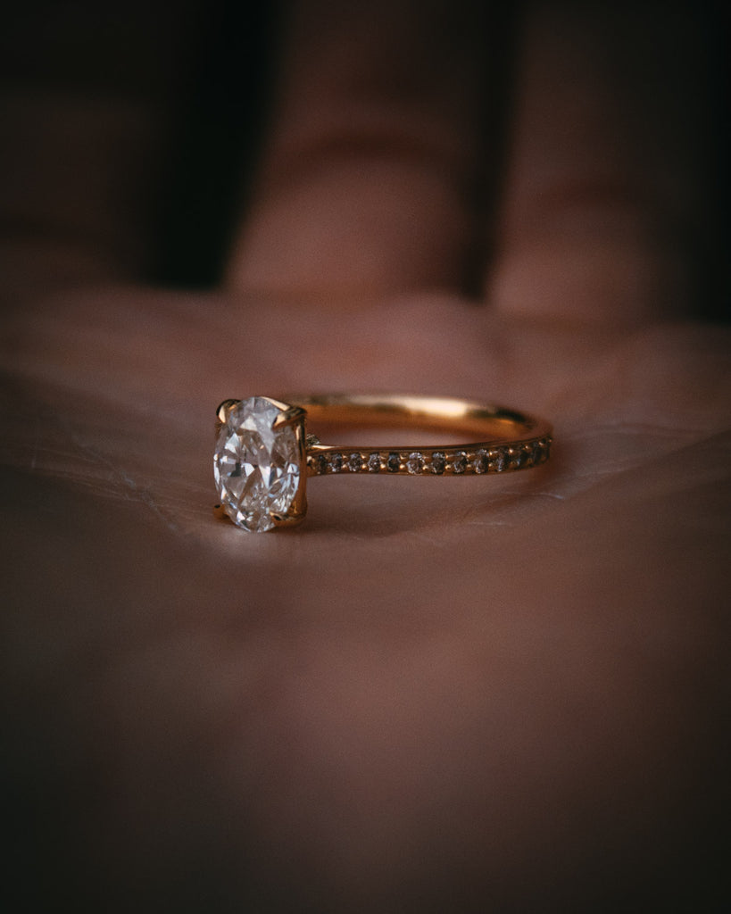 Bespoke Oval Diamond Engagement Ring with Champagne Diamond Band