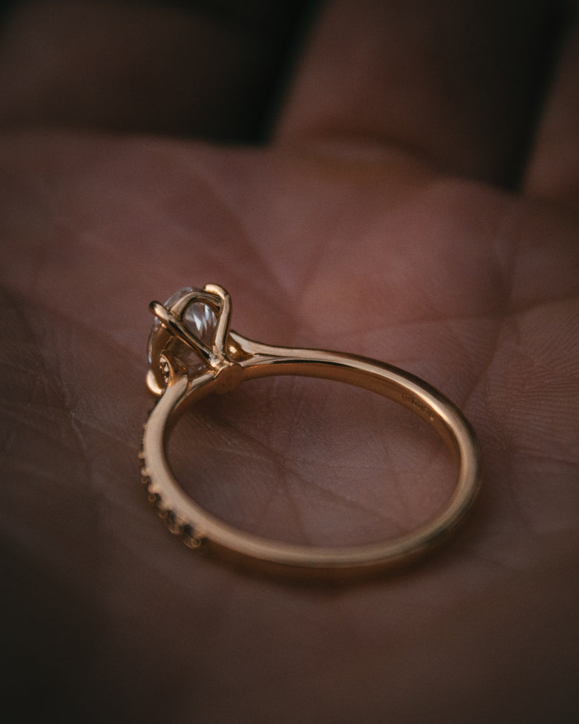 Bespoke Oval Diamond Engagement Ring with Champagne Diamond Band
