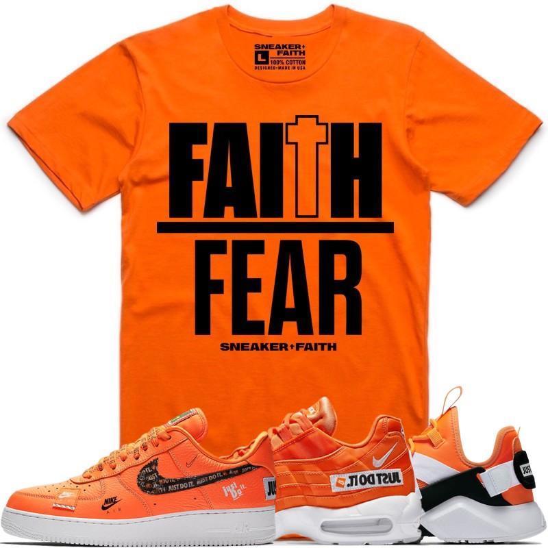 orange nike just do it shirt