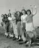 1950s women waving. Copyright holder unknown.