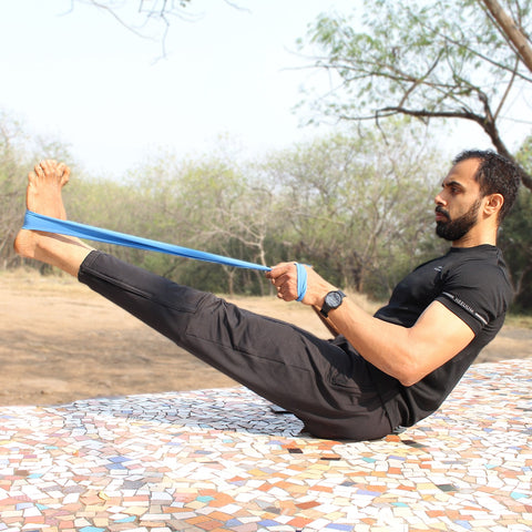 A person using a resistance band for a workout 