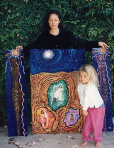 Jingalu Craig, with her daughter and one or her artworks