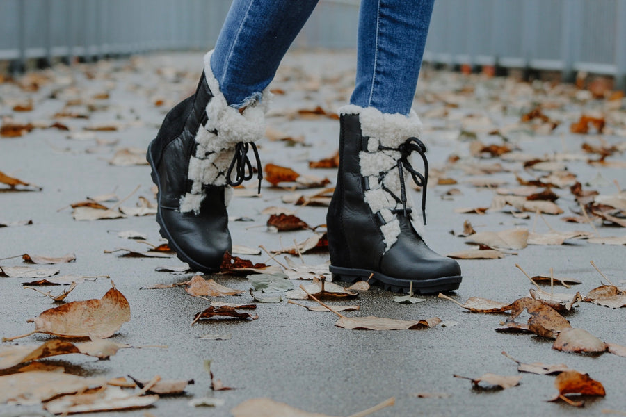 joan of arctic wedge genuine shearling bootie