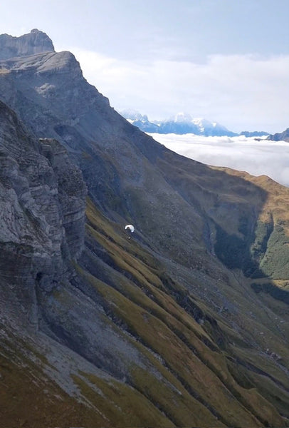 paragliding in the Alps with the Glacier Optics mountain sunglasses