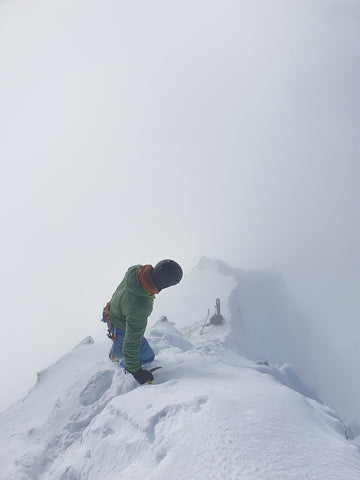 Nicolas Gendre at the summit of the Weisshorn, in the Swiss Alps