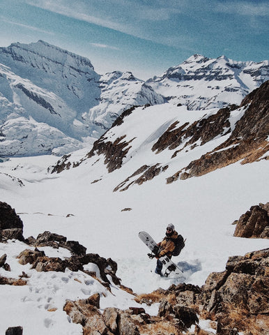 michel kropf with his west snowboard ready to drop in during his road trip through the swiss alps with glacier optics