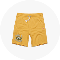 Green Bay Packers Pigskin Sweat Shorts from Homage. | Officially Licensed Vintage NFL Apparel from Homage Pro Shop.