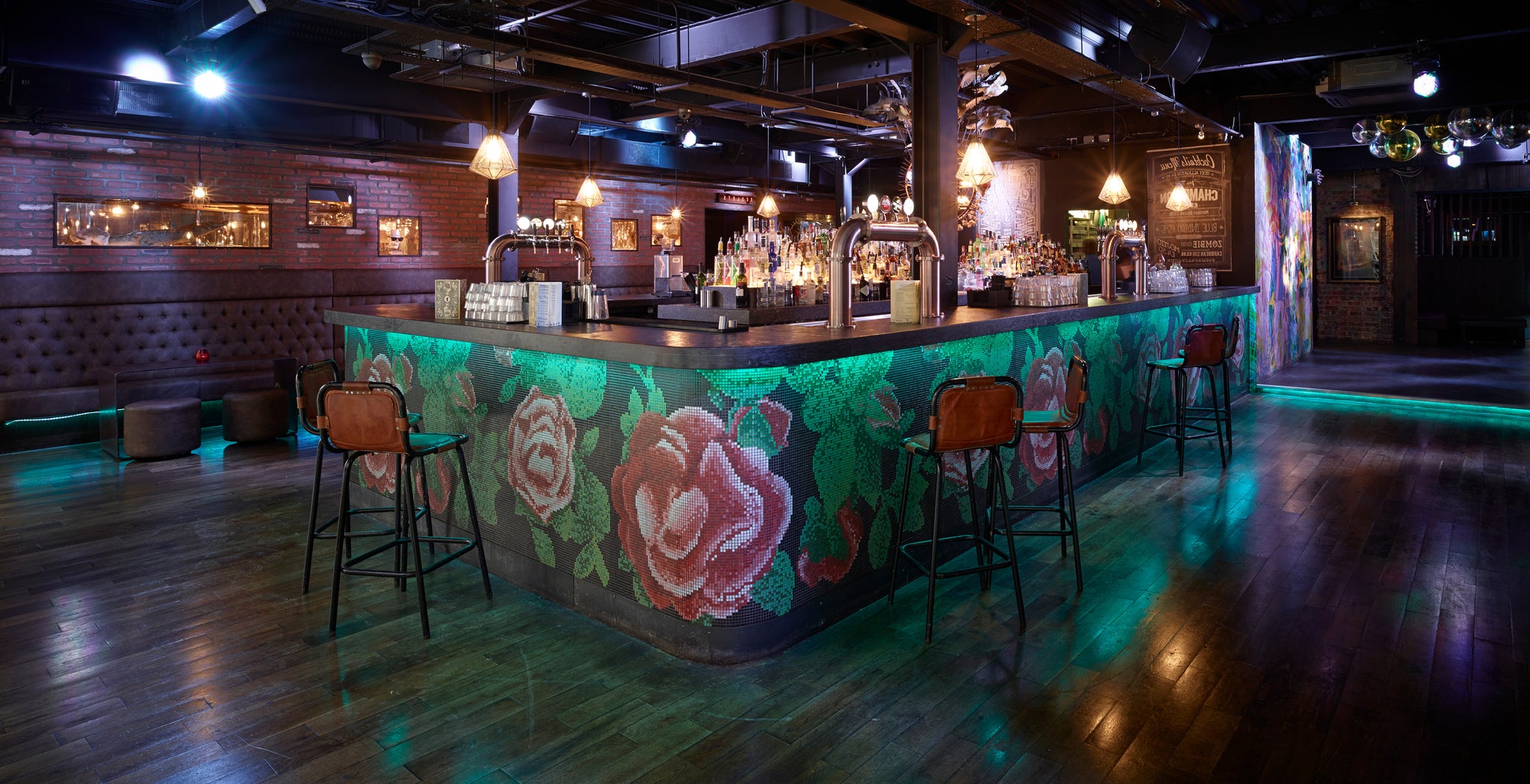 Vibrant bar with industrial lights