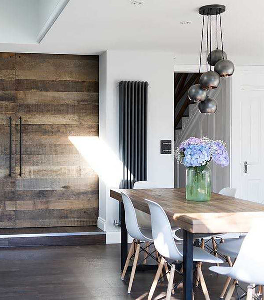 Statement vintage lights over a dining table