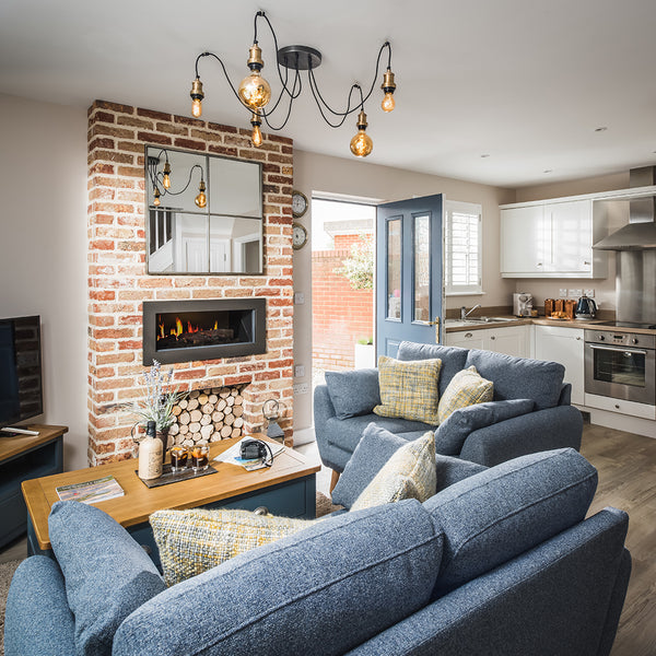 Cosy cottage interior with industrial style chandelier 