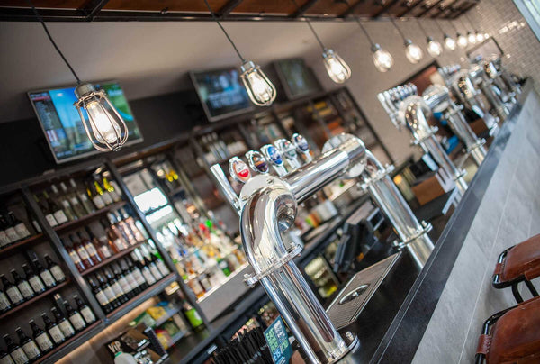 Industrial lights over a university bar