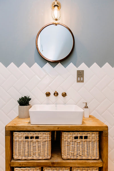 Brass metallic accents in bathroom interior