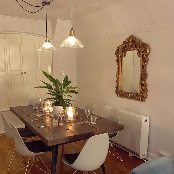 Dining room with glass pendant lights