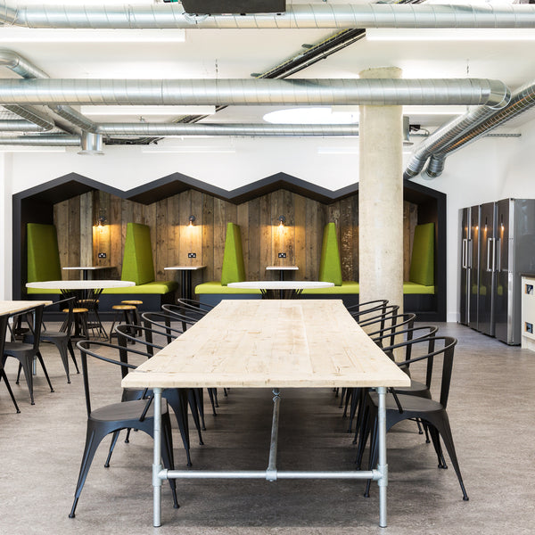 Desks and chairs in an open office space