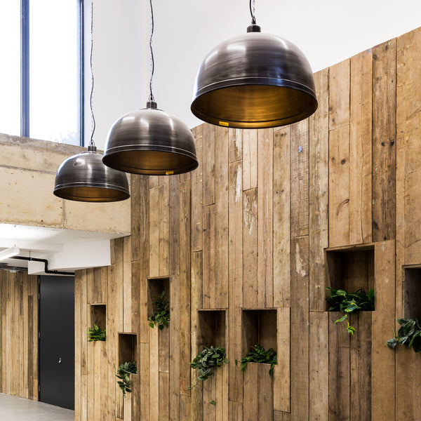 A rustic business interior with metal lights