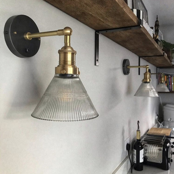 Glass funnel wall lights in a kitchen 