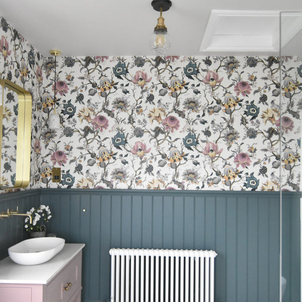 Bathroom interior with wallpaper and flush mount
