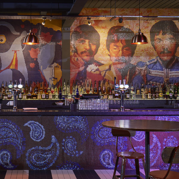 Vintage ceiling lights in colourful bar interior 