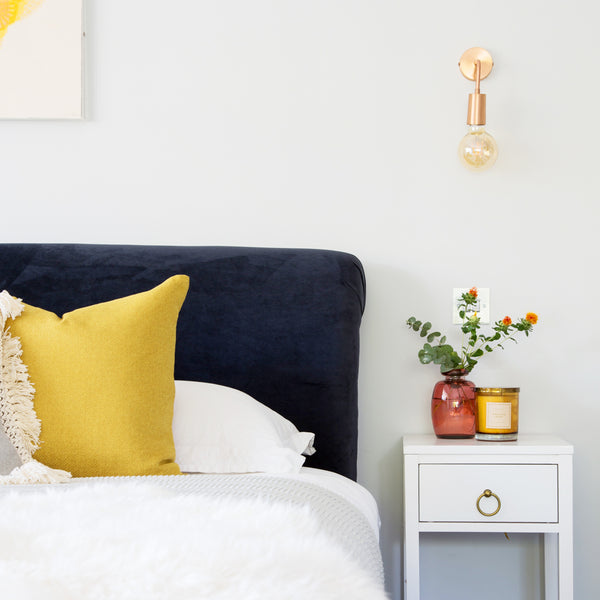 Vintage wall light in bedroom interior 