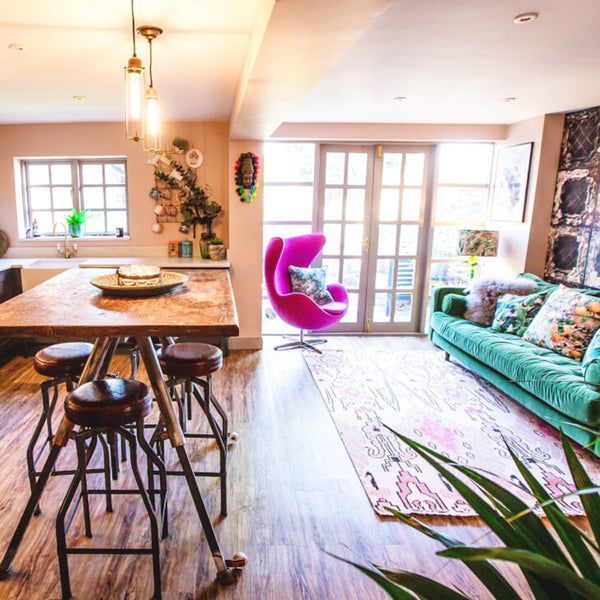 Vintage ceiling lights and stools in a dining room interior 